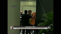 Malaysian police seize luxury goods in the raids