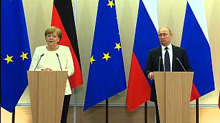 Merkel y Putin obligados a entenderse a pesar de sus diferencias