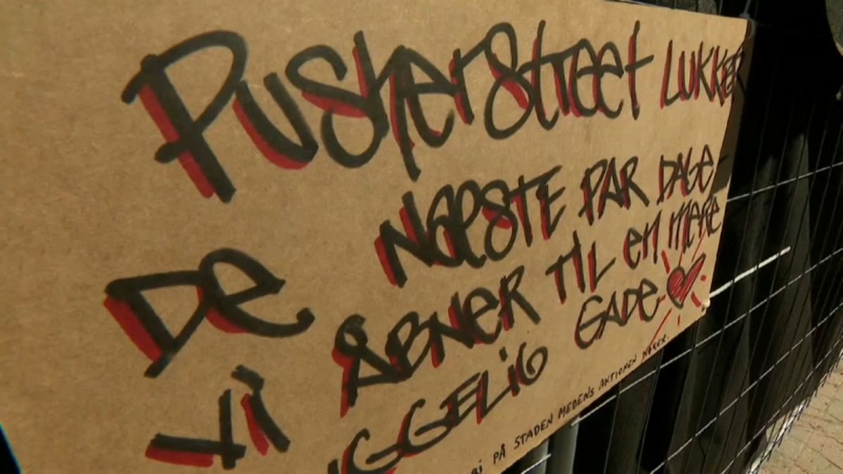 A sign saying that Pusher St. in Christiania will be shut for a few days