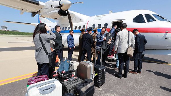 South Korean journalists board a plane for Pyongyang South Korean journalists board a plane for Pyongyang
