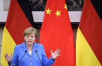 مرکل: آلمان و چین به برجام پایبند می‌مانند