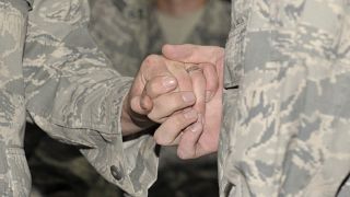 Two U.S. soldiers get married. 