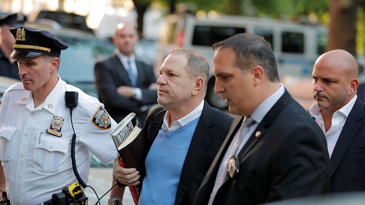 Film producer Harvey Weinstein arrives at the 1st Precinct in Manhattan