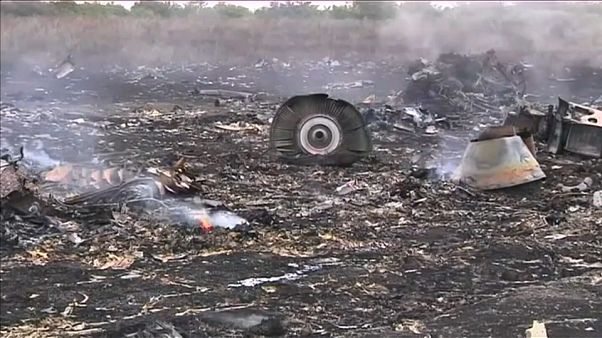 Remains of MH17 flight shot down by Russian missile over eastern Ukraine Remains of MH17 flight shot down by Russian missile over eastern Ukraine