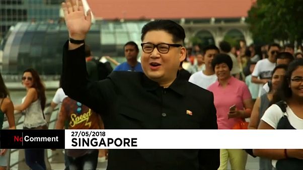 Un "Kim Jong Un" radieux dans les rues de Singapour Un "Kim Jong Un" radieux dans les rues de Singapour
