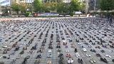 pairs of shoes representing lives lost in Mideast greet EU FMs