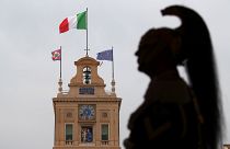 Italian military officer stands guard inside the Presidential Palace