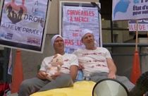 Paris police don pyjamas for protest over working conditions