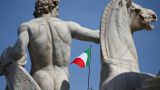 The Italian flag waves over the Quirinal Palace in Rome