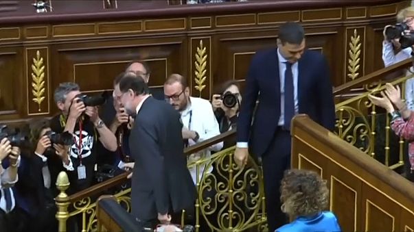 Ousted Spanish prime minister Mariano Rajoy and his successor
