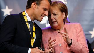 Merkel e l'euro, un passo verso Macron
