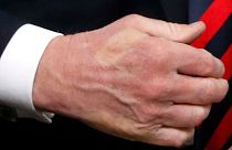 Trump shakes hands with France's President Macron