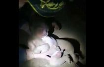 Brazilian police pull the baby girl from the soil
