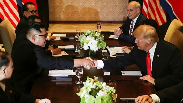 Donald Trump shakes hands with North Korea's leader Donald Trump shakes hands with North Korea's leader