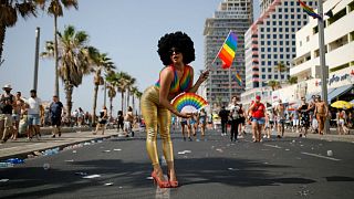 Revellers take part in a gay pride parade in Tel Aviv, Israel June 8, 2018.