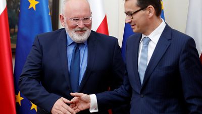 Frans Timmermans and Mateusz Morawiecki meeting in Warsaw