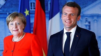 German Chancellor Angela Merkel welcomes French President Emmanuel Macron 