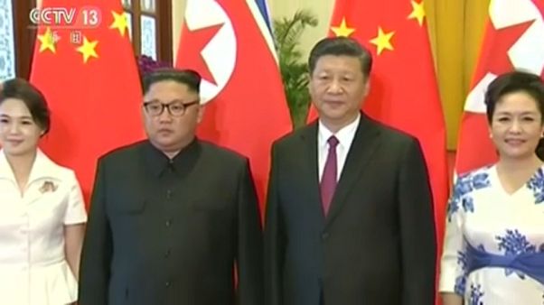 Kim Jung-Un e Xi Jinping Kim Jung-Un e Xi Jinping