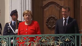 Макрон и Меркель призывают "играть по правилам"