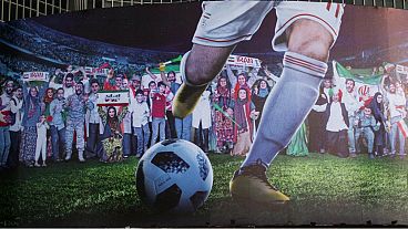 ورود زنان به استادیوم آزادی در بیلبورد میدان ولیعصر