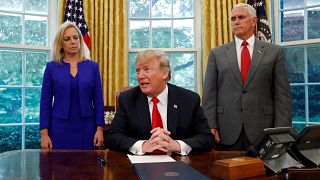 Trump signs executive order to keep immigrant families together