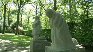 Statues of grieving parents at Vladslo cemetary in Belgium