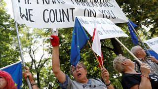 Demonstrators rally during meeting of Polish PM and  EC's Frans Timmermans