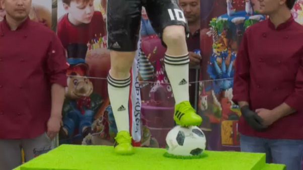 O bolo com a figura de Lionel Messi O bolo com a figura de Lionel Messi