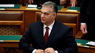 Designer offers to adjust Orban's suit for free