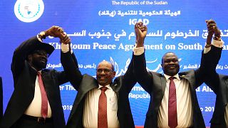 South Sudan's rival leaders after signing a peace deal