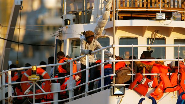 Rescued migrants disembarking in Europe Rescued migrants disembarking in Europe