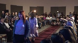 Refugee girls put on fashion show for own clothing label in Jordan