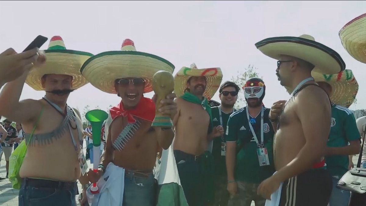 World Cup fans don fancy outfits to show support for their teams