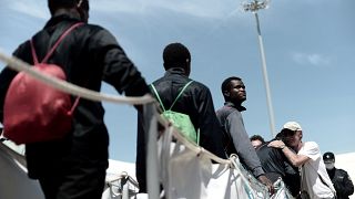 Migrants dismbarking in Europe