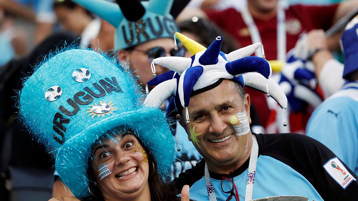 Uruguay joins the final eight after beating Portugal 2-1