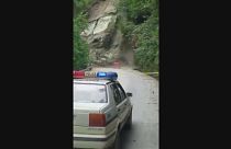 Huge landslide cuts off road in southwest China