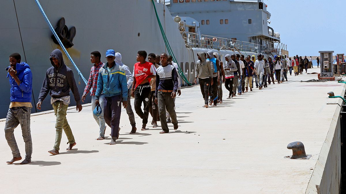 Migrants arrive in Tripoli after being rescued by Libyan coast guards. 