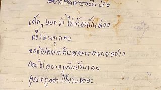 A handwritten note written by a diver during a rescue misssion in Thailand