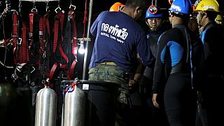 Four Thai boys saved from cave as the rest wait for rescue to resume Monday