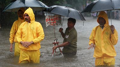 Monsoon rains flood India's streets in Mumbai