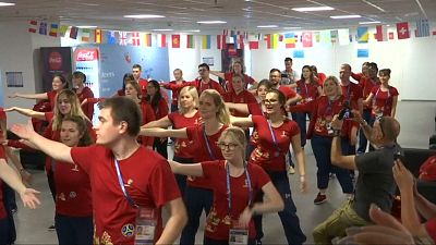 World Cup volunteers shimmy in flash mob and join pitch on Red Square