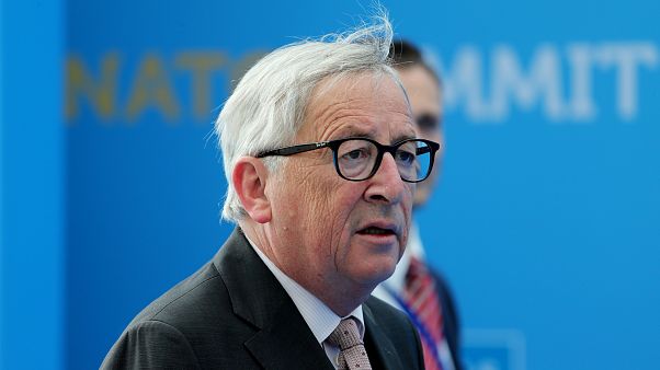 Juncker seen stumbling before NATO gala dinner, leaders step in to help Juncker seen stumbling before NATO gala dinner, leaders step in to help