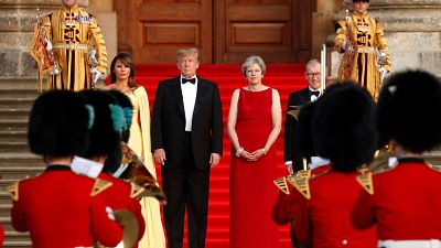 Trump, after questioning May's Brexit plan, arrives in 'hot spot' UK