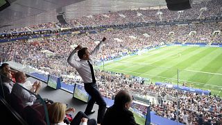 Emmanuelle Macron celebrates a French goal