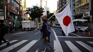 Symbolbild - Verkleideter Mensch in Tokio