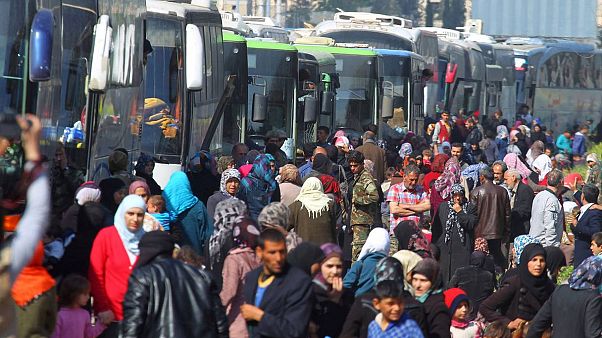 Suriye'de binlerce kişiyi kapsayan tahliye anlaşması Suriye'de binlerce kişiyi kapsayan tahliye anlaşması