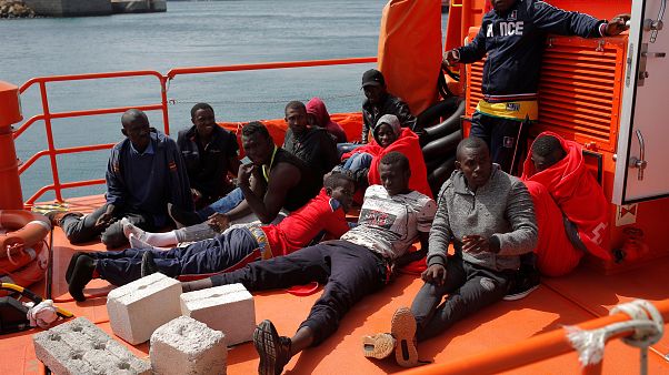 Migrants on a Spanish rescue boat Migrants on a Spanish rescue boat