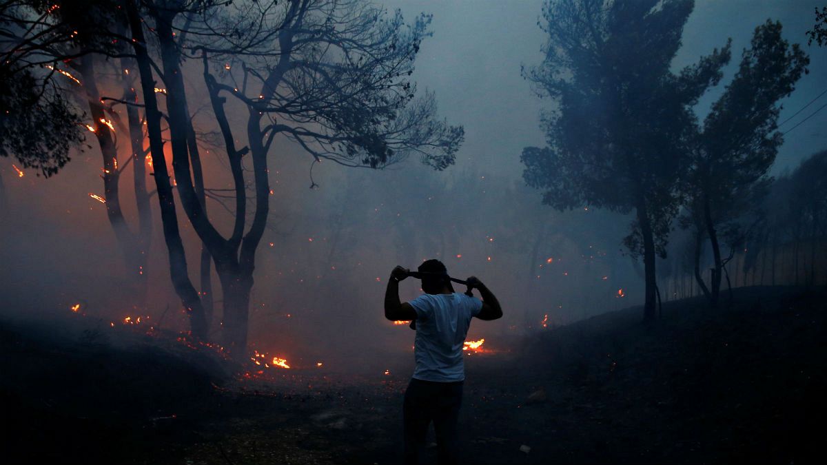 Greece appeals for help after deadly fires ravage coast