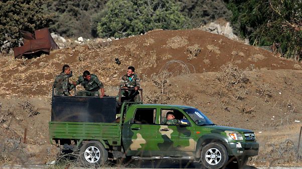 Suriye ordusu 4 yıl sonra Kunetra'ya bayrak dikti Suriye ordusu 4 yıl sonra Kunetra'ya bayrak dikti