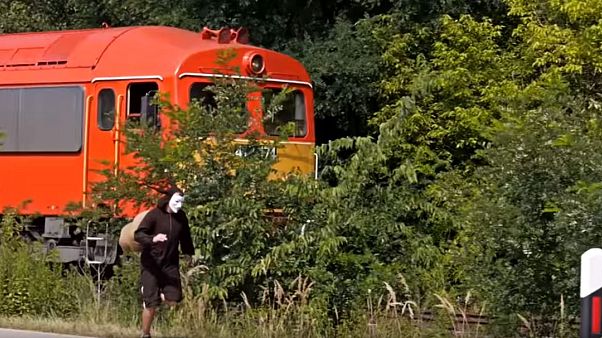 Man races against 'snail train' to prove his point Man races against 'snail train' to prove his point